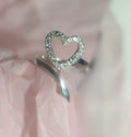Heart-shaped ring with sparkling stones 